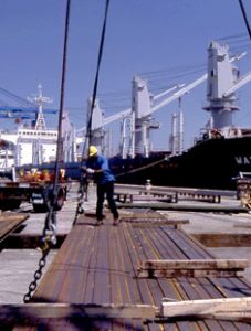 man-loading-steel-at-port-docks